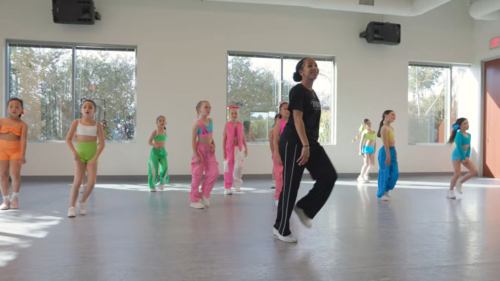 Dance instructor teaching young girls hip hop at Evolution Dance Center Carlsbad