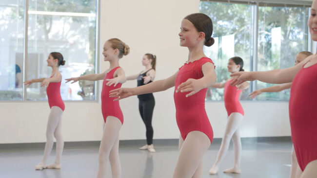 Young teen girls learning ballet dance at Evolution Dance Center Carlsbad