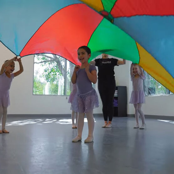 Cute young girls leaning to dance.