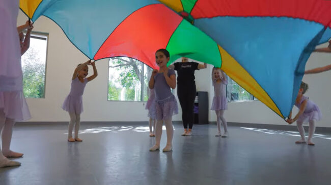 Cute young girls leaning to dance.